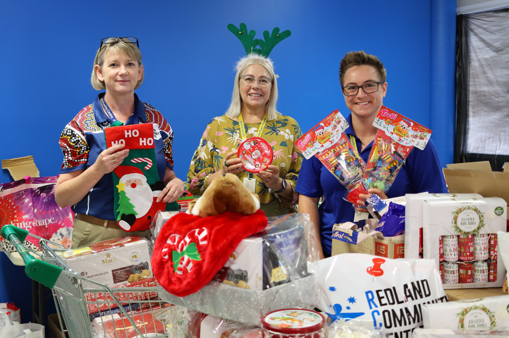 Redland Community Centre team packing festive food bags